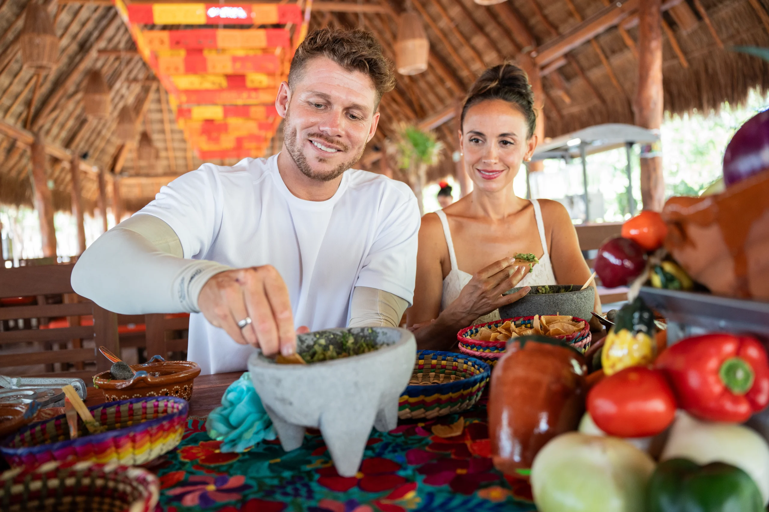 Aguas frescas and buffet spread at KUZA Deluxe Pass experience